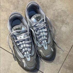 New Balance unisex Silver and Gray Sneakers